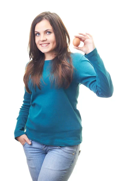 Attractive smiling young woman in a blue shirt holding in her le — Stock Photo, Image