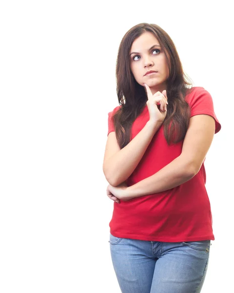 Attractive smiling young woman in a red shirt holds finger on he — Stock Photo, Image
