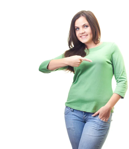 Attractive smiling young woman in a green shirt showing her righ — Stock Photo, Image