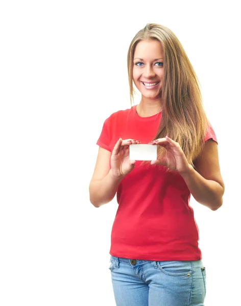 Jovem sorridente atraente em uma camisa vermelha segura um cartaz . — Fotografia de Stock