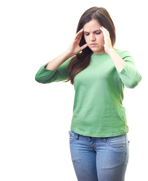 Mujer joven atractiva con una camisa verde que sufre de un dolor de cabeza —  Fotos de Stock