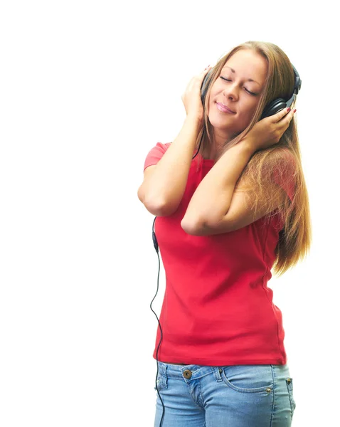 Atractiva joven sonriente en una camisa roja con auriculares, e —  Fotos de Stock