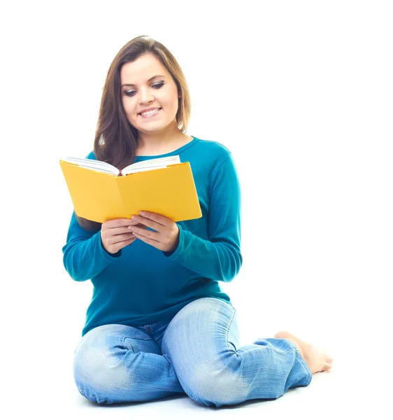 Attractive smiling young woman in a blue shirt and blue jeans si — Stock Photo, Image