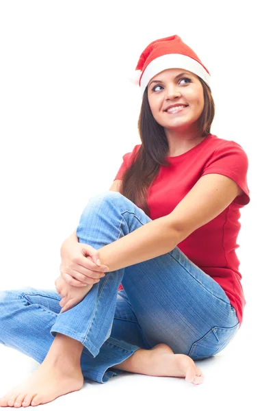 有吸引力的微笑着一件红色的衬衫和圣诞节的年轻女人医管局 — 图库照片
