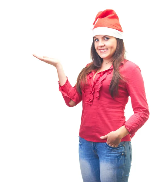 Attractive young woman in a red shirt and a Christmas hat holds — Stock Photo, Image