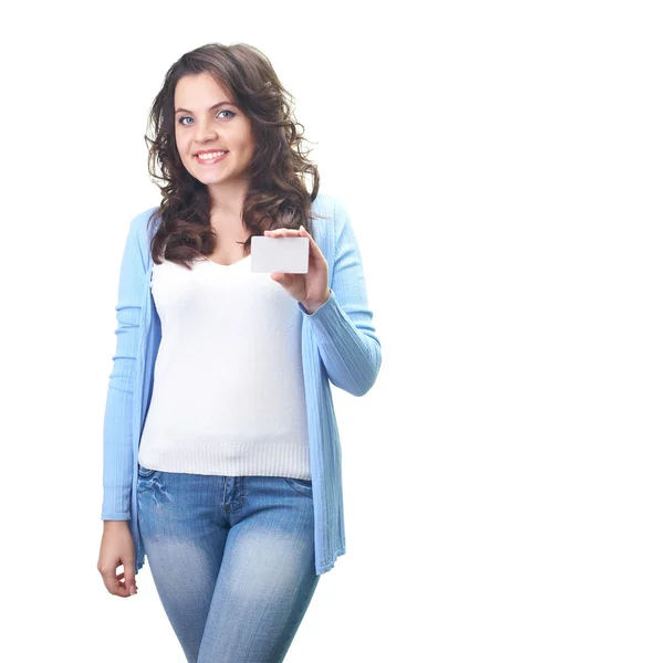 Attractive smiling young woman in a blue shirt holding in her le — Stock Photo, Image