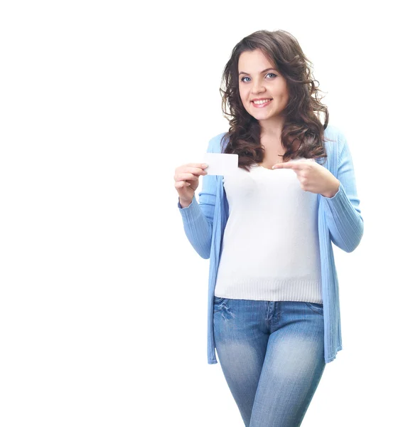 Attractive smiling young woman in a blue shirt holding in her ri — Stock Photo, Image