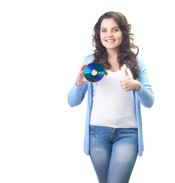 Attractive smiling young woman in a blue shirt holding in her ri — Stock Photo, Image