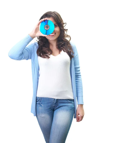 Attractive smiling young woman in a blue shirt holding disk near — Stock Photo, Image