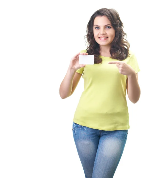 Attractive smiling young woman in a yellow shirt holding in her — Stock Photo, Image