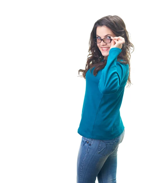 Aantrekkelijke lachende jonge vrouw in een blauw shirt en glazen. — Stockfoto