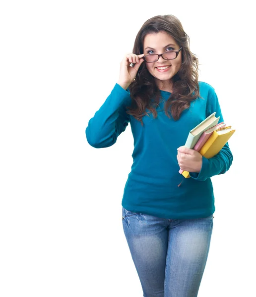 Attractive smiling young woman in a blue shirt and glasses holdi — Stock Photo, Image