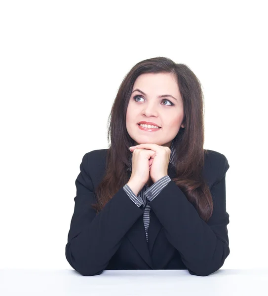 Attractive smiling young woman in a black jacket and blouse sitt — Stock Photo, Image