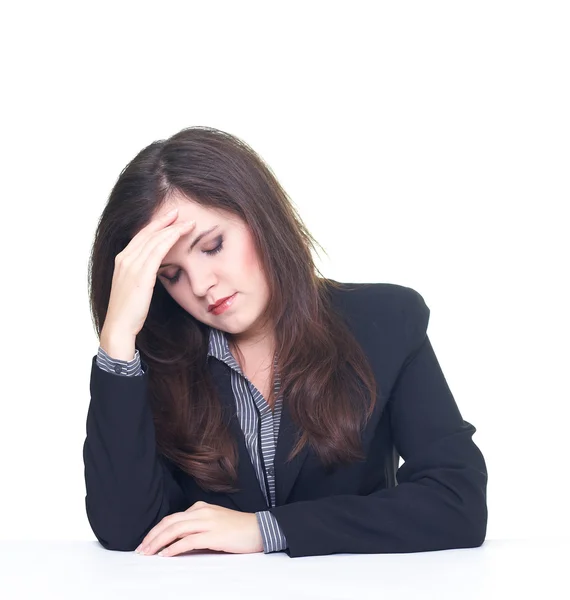 Attractive young woman in a black jacket and blouse sitting at t — Stock Photo, Image