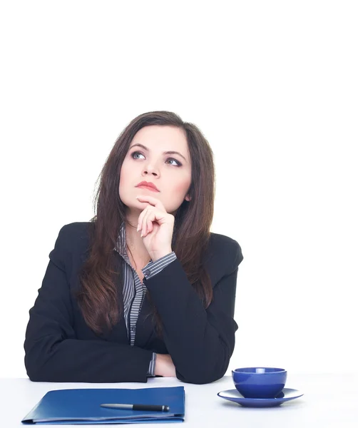 Attractive thoughtful young woman in a black jacket and blouse s — Stock Photo, Image