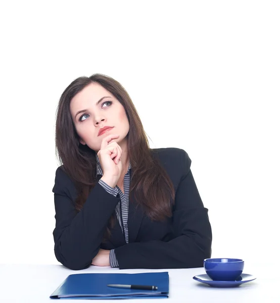 Attractive thoughtful young woman in a black jacket and blouse s — Stock Photo, Image