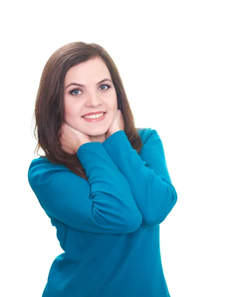 Die attraktive lächelnde junge Frau im blauen Hemd umarmt ihre Arme. — Stockfoto