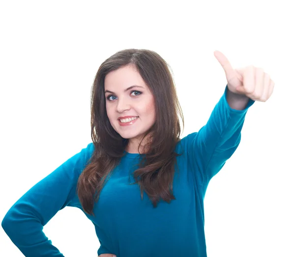 Atractiva joven sonriente con una camisa azul muestra su izquierda ha — Foto de Stock