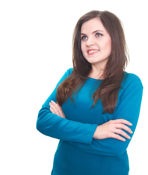 Attraktivt leende ung kvinna i en blå skjorta står med armarna — Stockfoto
