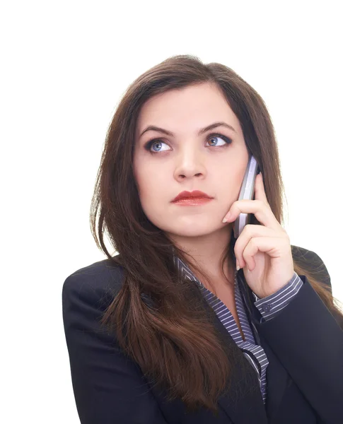 Attractive young woman in a black jacket talking on a mobile pho — Stock Photo, Image