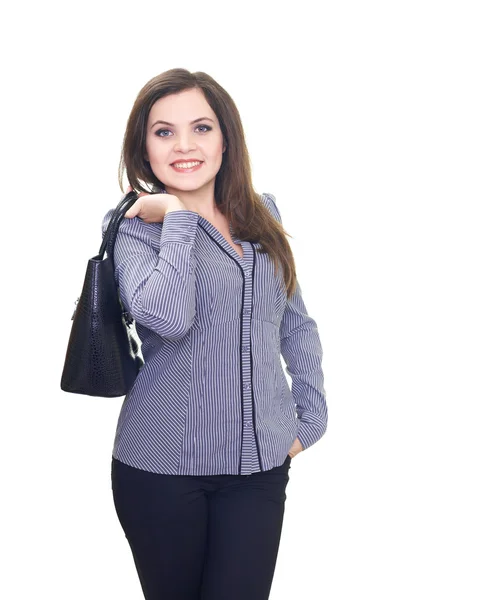 Atractiva mujer joven en una blusa gris mantiene detrás de la espalda un —  Fotos de Stock