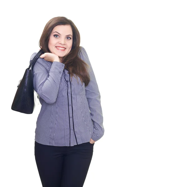 Attraktivt leende ung kvinna i en grå blus håller bakom den — Stockfoto