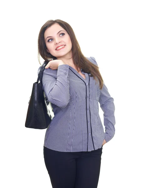 Attractive young woman in a gray blouse keeps behind the back a — Stock Photo, Image