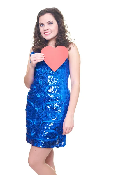 Atractiva joven sonriente con un vestido azul brillante sosteniendo —  Fotos de Stock