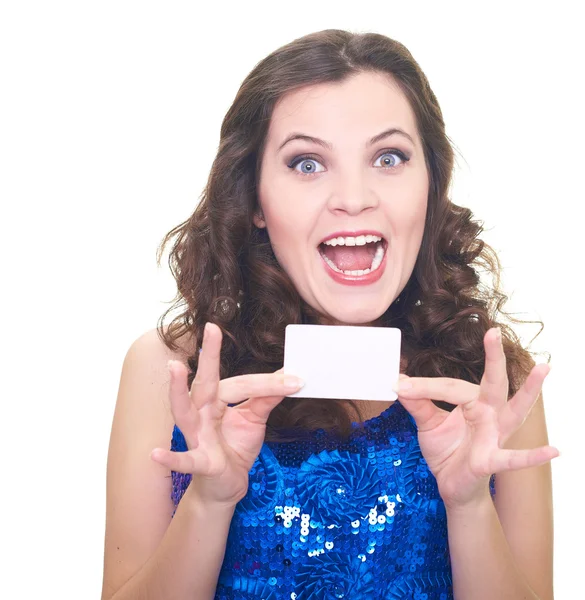 Surprised young woman in a blue brilliant dress holding poster. — Stock Photo, Image