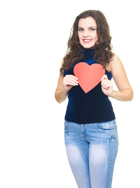 Atraktivní usměvavá mladá žena v modré košili drží symbol — Stock fotografie