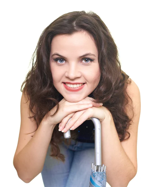 Portrait of a happy young woman in a blue shirt. Woman put her h — Stock Photo, Image