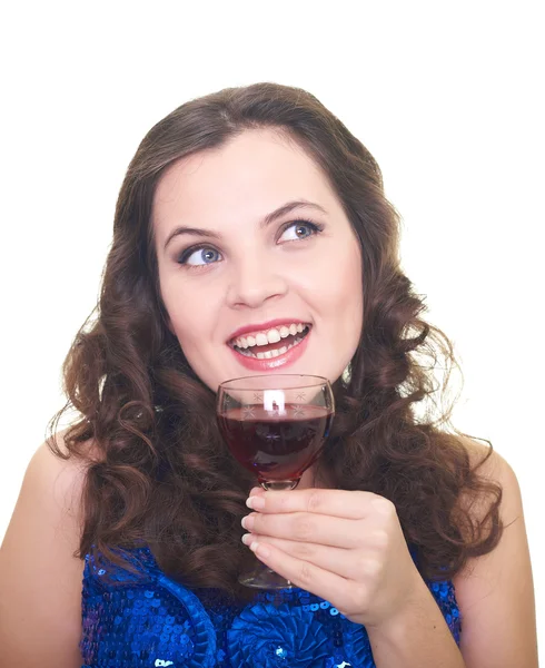 Attractive smiling young woman in brilliant blue dress holds a g — Stock Photo, Image