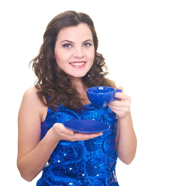 Jovem sorridente atraente em um vestido azul brilhante segurando — Fotografia de Stock