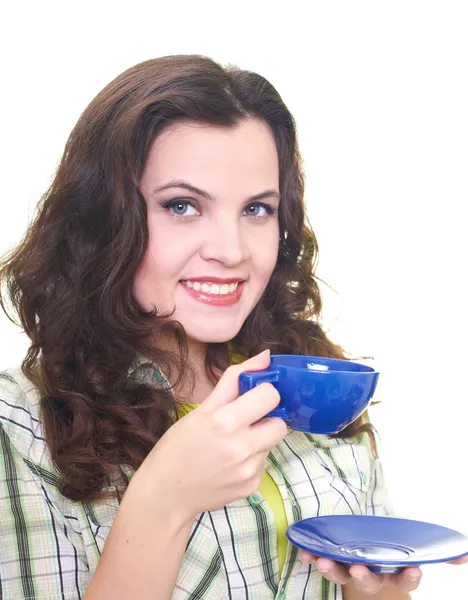 Attractive smiling young woman in a checkered shirt holding a bl — Stock Photo, Image