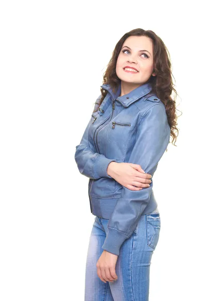 Happy young woman in a gray jacket looks up. — Stock Photo, Image