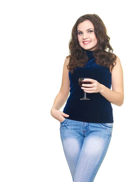 Attraente sorridente giovane donna con una camicia blu che tiene un bicchiere o — Foto Stock