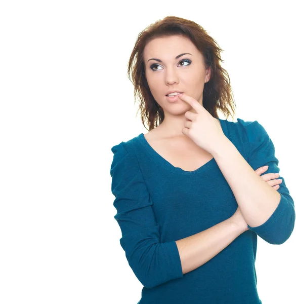 Attraktiv ung kvinna i en blå skjorta ser på den övre-righ — Stockfoto