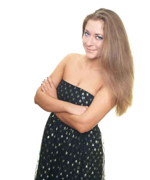 Attraktive junge Frau im schwarzen Kleid mit gefalteten Händen stehend — Stockfoto