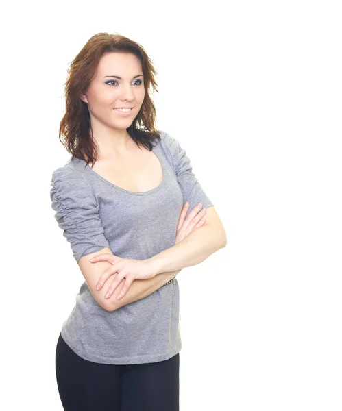 Attractive young woman in a gray T-shirt. — Stock Photo, Image