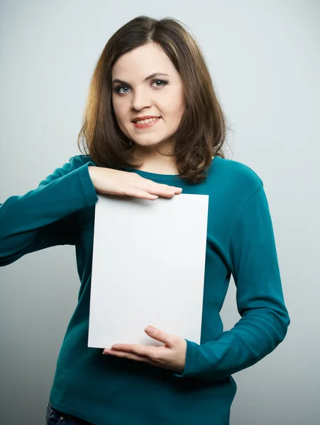 Happy young woman in a blue shirt and jeans. Woman holds a poste — Stock Photo, Image