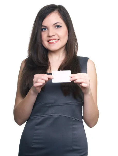 Attraente giovane donna in un abito da lavoro grigio. Donna tiene una p — Foto Stock