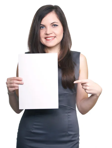 Attractive young woman in a gray business dress. Woman holds a p — Stock Photo, Image