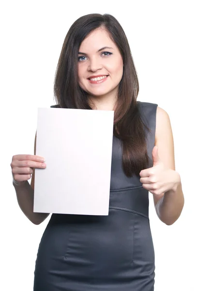 Attractive young woman in a gray business dress. Woman holds a p — Stock Photo, Image