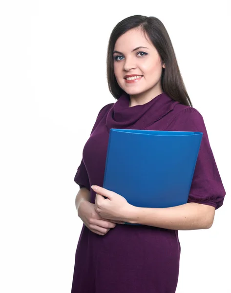 Attraktive junge Frau im Kleid. Frau hält blauen Ordner in der Hand. — Stockfoto