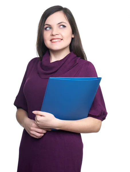 Attraktive junge Frau im Kleid. Frau hält blauen Ordner in der Hand — Stockfoto