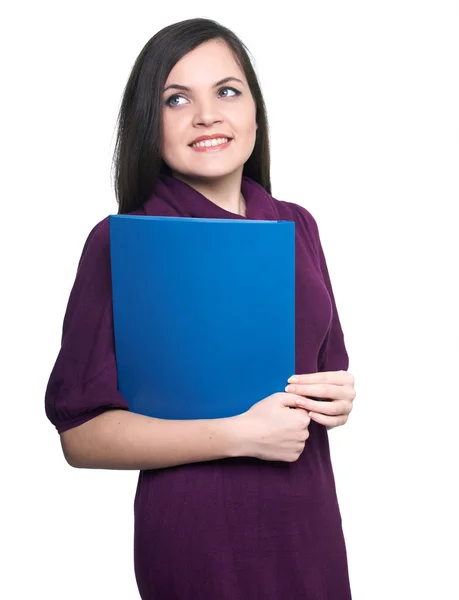 Una joven atractiva con un vestido. Mujer sostiene una carpeta azul y —  Fotos de Stock