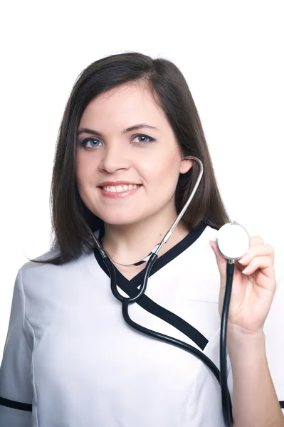 Attractive young nurse holding a stethoscope. — Stock Photo, Image