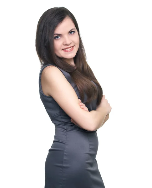 Aantrekkelijke jonge vrouw in een grijze zakelijke jurk. — Stockfoto