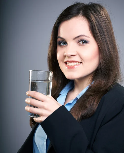 Attractive young woman in a black jacket. Woman holding a glass — Stock Photo, Image