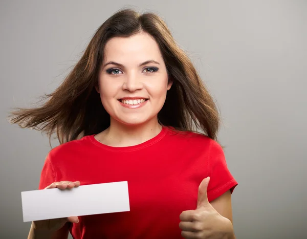 Attractive young woman in a red shirt. Woman holds a poster and — Stock Photo, Image